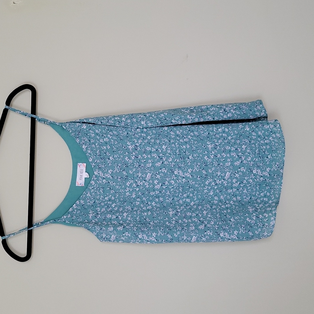 Green lined spaghetti strap womens top with small floral pattern